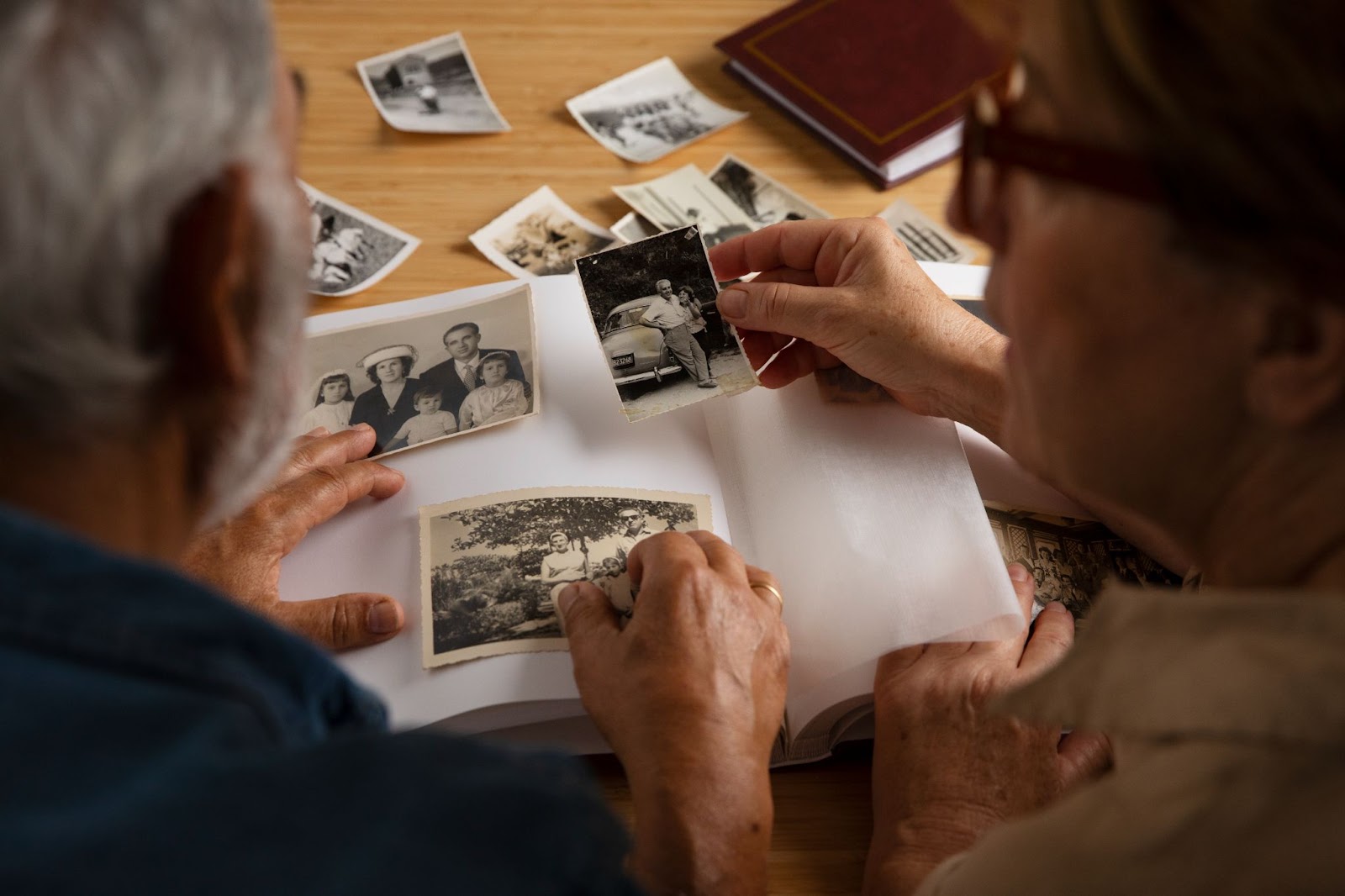 Elderly people looking at their photos